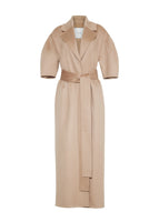 Flat lay of a long camel regency coat with short balloon sleeves and a front waist tie in double face cashmere.