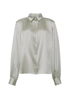 A flat lay of the front of the pistachio Blouse with Pearls in Silk Charmeuse.