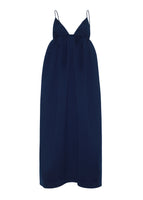 A ghost image of the front of the esme dress in technical satin in navy.