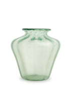 An iridescent green glass vase on a pale pink background.