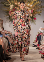A model walking down the runway wearing the Sigrid Dress in Printed Crepe de Chine.