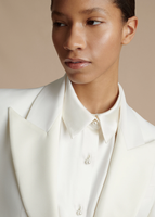 A cropped in image featuring the beautiful collar details on the Tux Jacket in Radzimir Wool.
