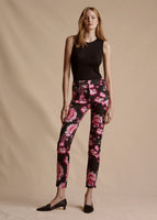 Model is wearing the Daphne Pant in Printed Cotton Twill in a black and pink multi floral print. It is paired with the Black Shell Top.