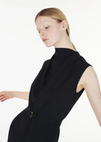 Close up of model wearing the Blythe Jumpsuit in Silk Crepe in Black.