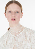 Close up of the Chantilly lace turtleneck