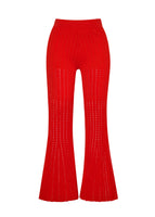 A flat lay of a cropped flare red pant with pointelle stitch.