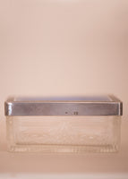Etched glass detailing on a rectangular dish. 