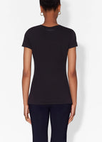 Model wears a black short sleeve crewneck t-shirt in pima cotton