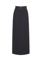 Flat lay of long black pencil skirt in double face stretch wool. Has a black belt with a gold buckle.