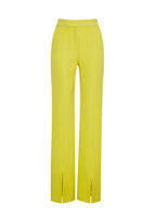 Flat lay of a long citrine double face stretch wool pant with a slit front.