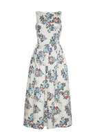 Flat lay of fit and flare straight neck sleeveless white mid length dress in multicolor flower printed matelasse.