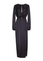 A flat lay of a longsleeve floor length black satin dress with a V-neckline and a black belt with a gold buckle.