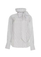 Flat lay of a long sleeve blouse with high neckline in stripe shirting with a tied bow at the front neck.