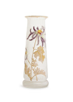 A tall Mont Joye glass vase with gold and purple enameling.