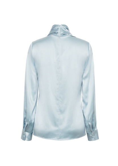 ghost image of the back of the bandera blouse in silk in mist