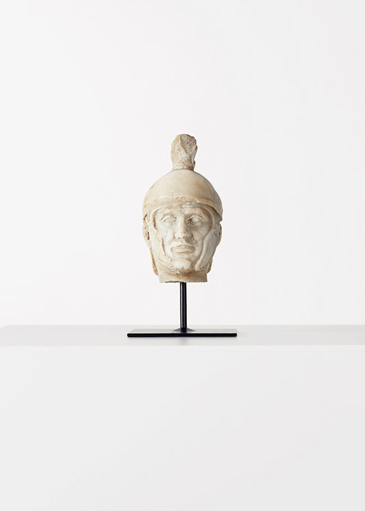 Grand tour model of a small head of a Roman soldier. Carved of Carrera marble, Italy. C. 19th century.