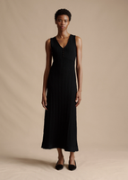 A model wearing the Mysa Dress in Ladder Knit in Black.