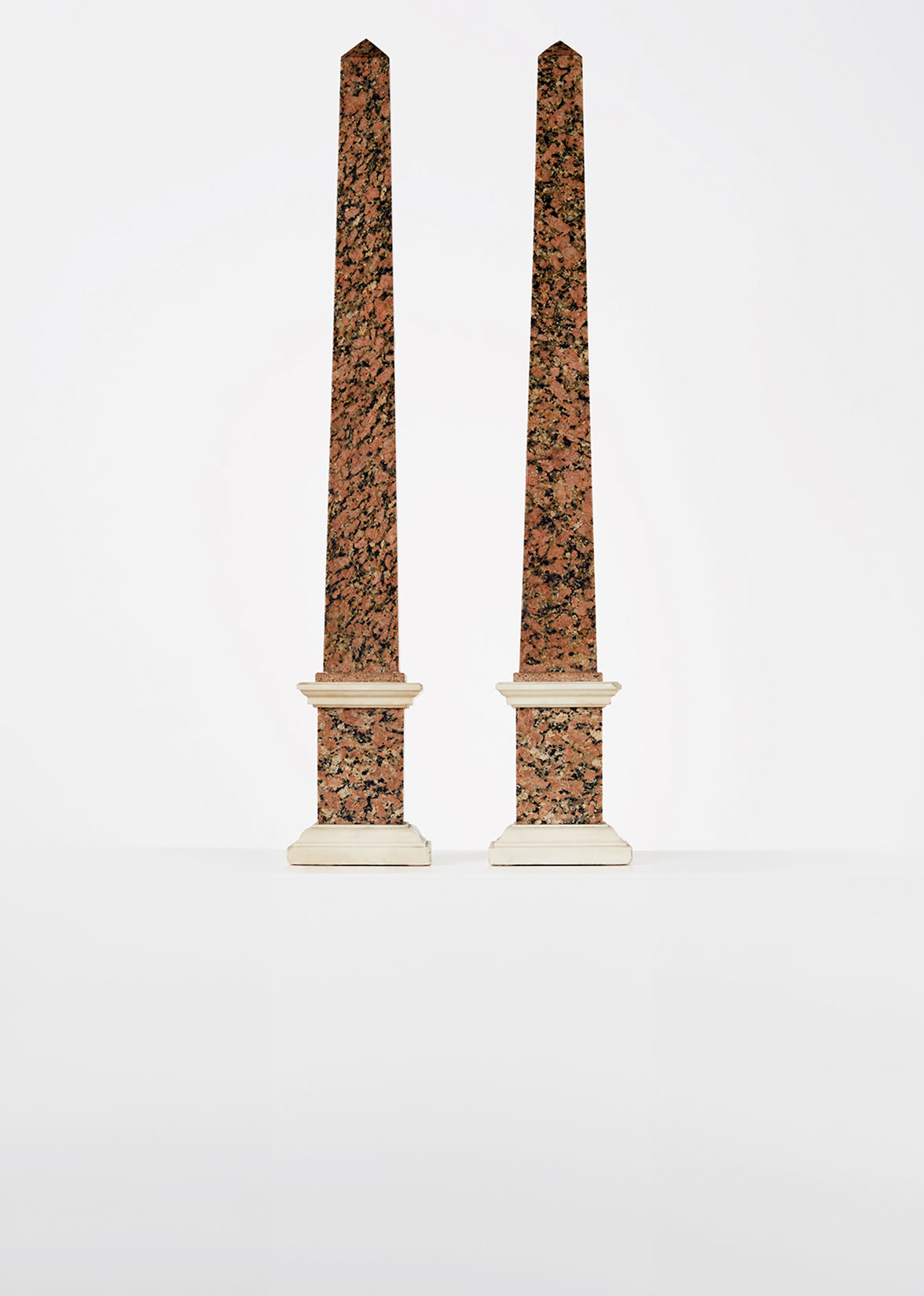 rosso granite and carrera obelisks, 19th c HOME Adam Lippes