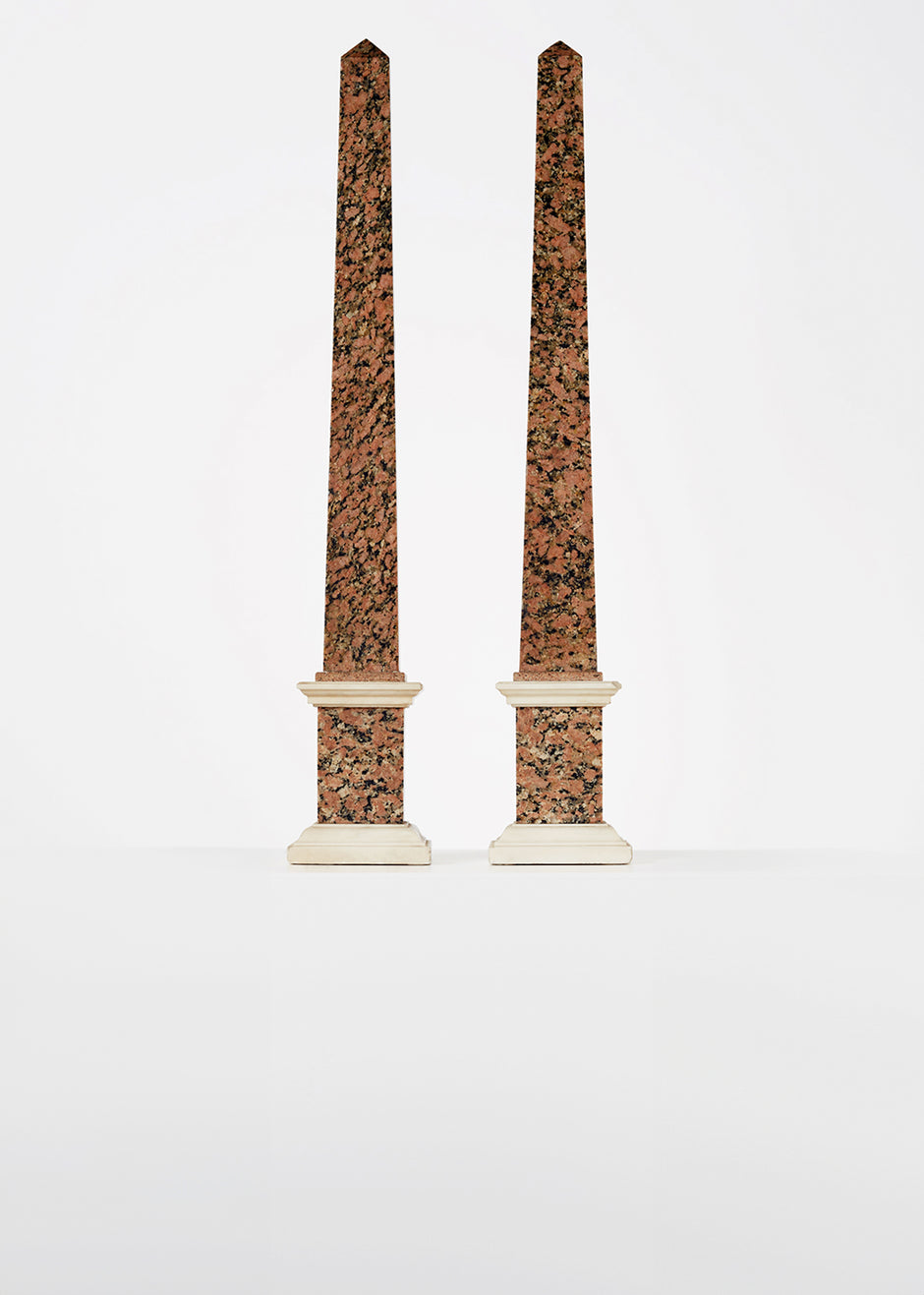 rosso granite and carrera obelisks, 19th c HOME Adam Lippes