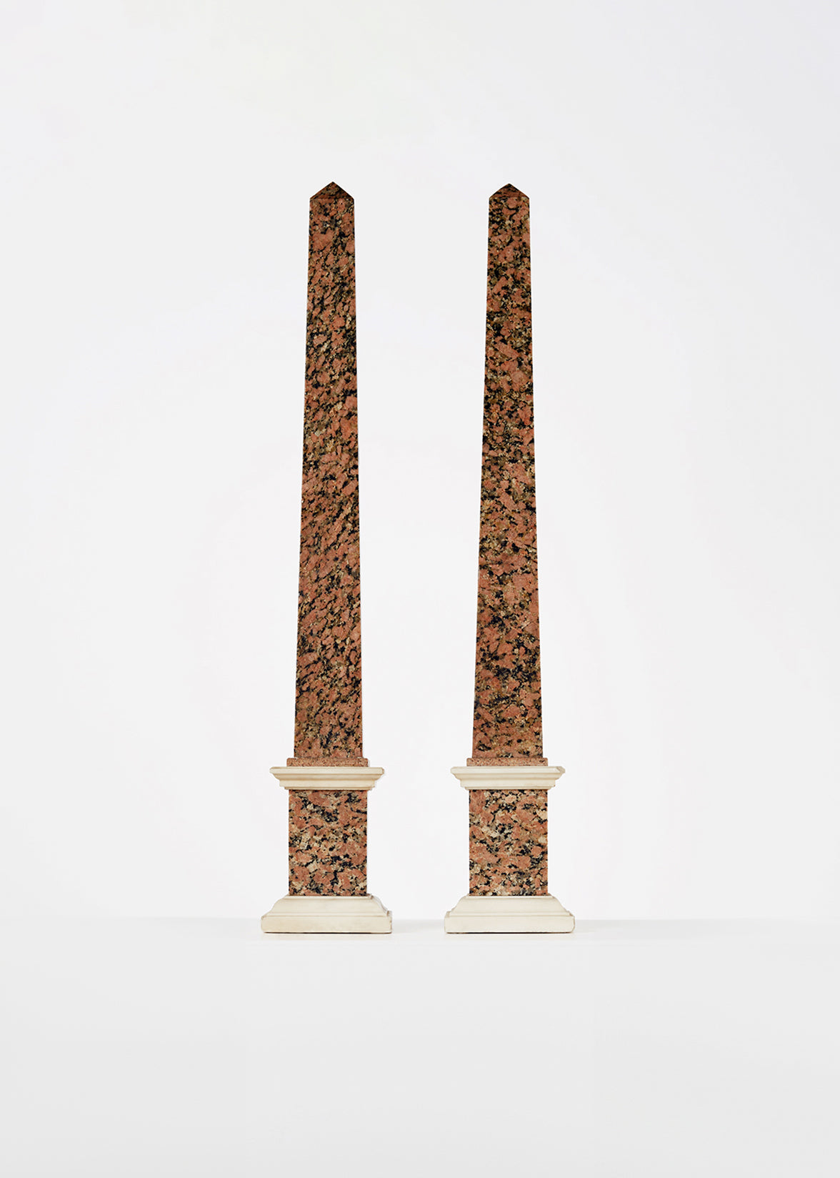 rosso granite and carrera obelisks, 19th c HOME Adam Lippes