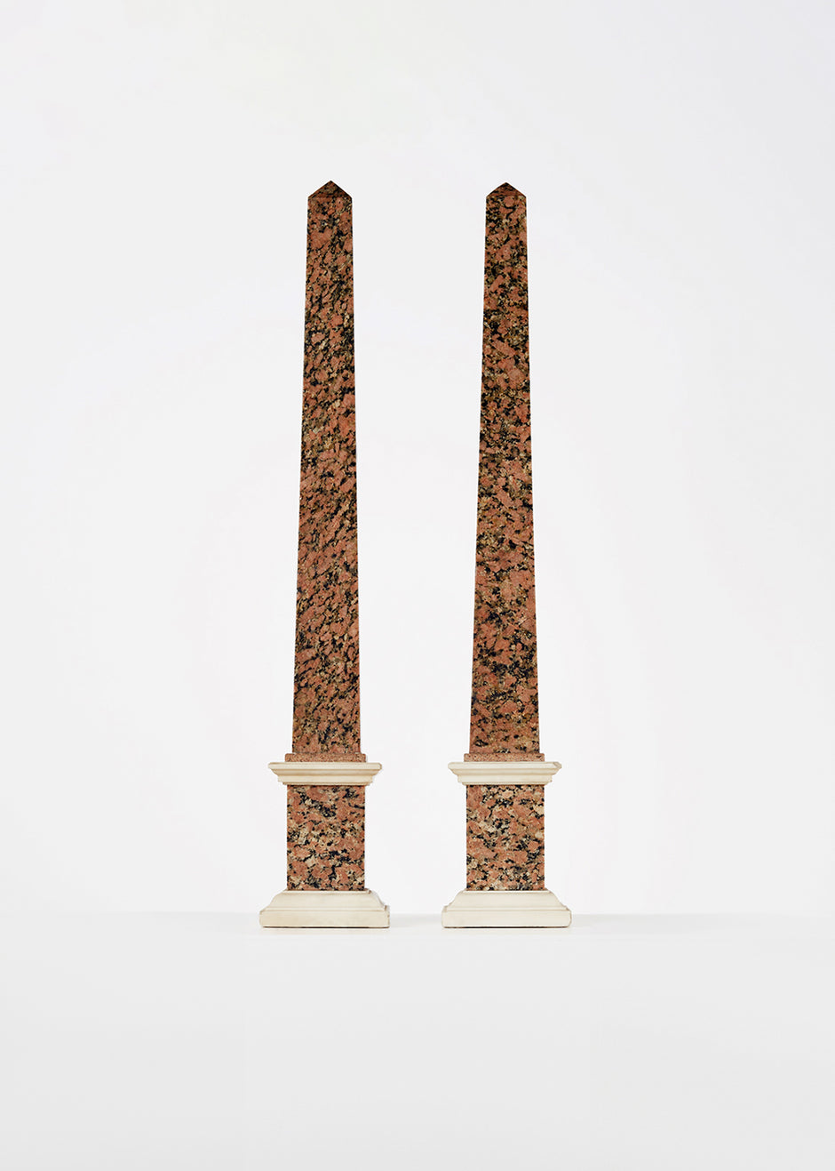 rosso granite and carrera obelisks, 19th c HOME Adam Lippes
