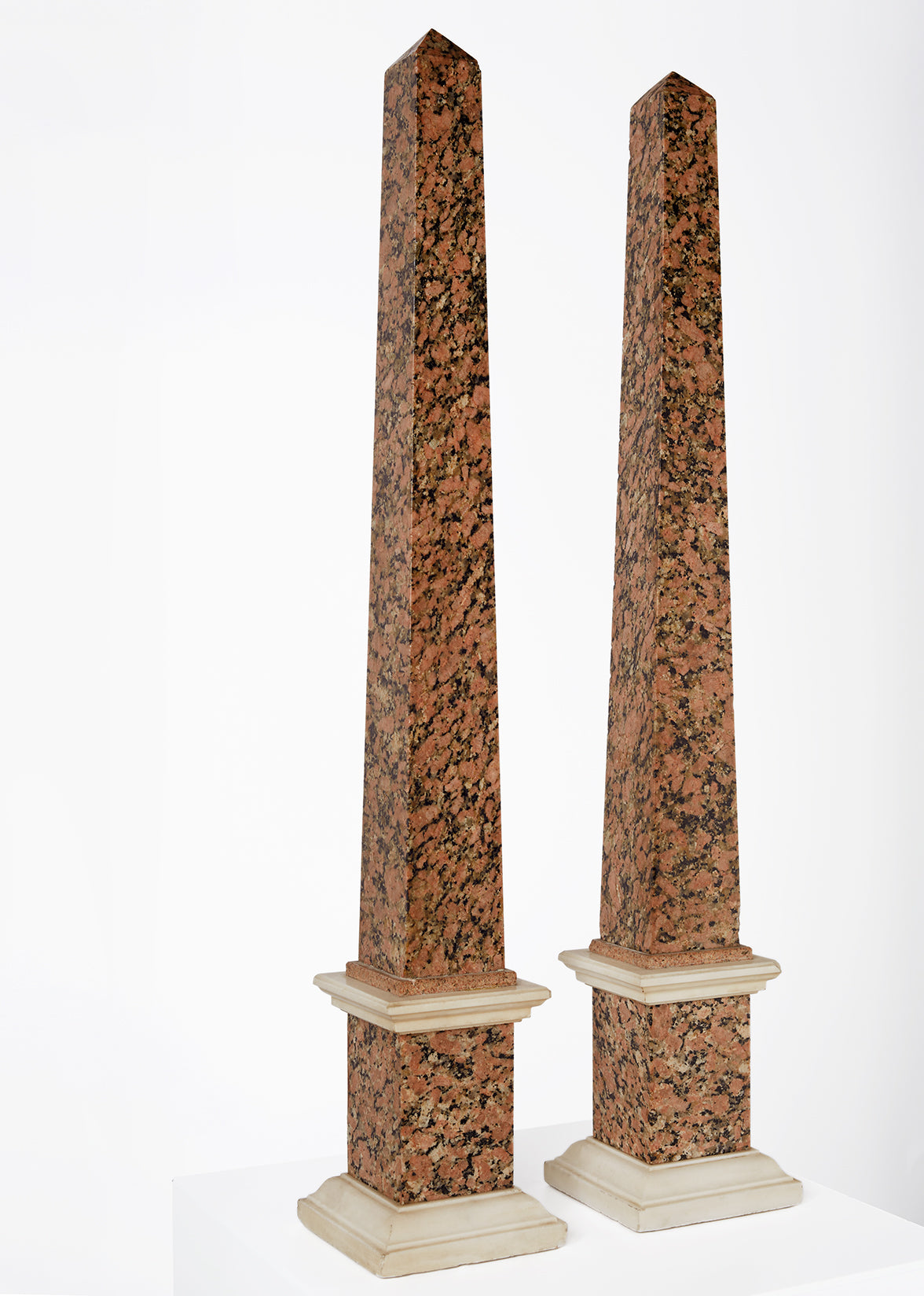 rosso granite and carrera obelisks, 19th c HOME Adam Lippes