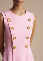 A close up of the beautiful floral button details on the Mini Aubrey Dress in Wool Crepe.