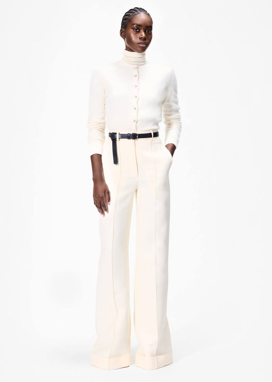 model wearing the cruz cardigan in ivory with deeda pant in silk wool in ivory by Adam Lippes
