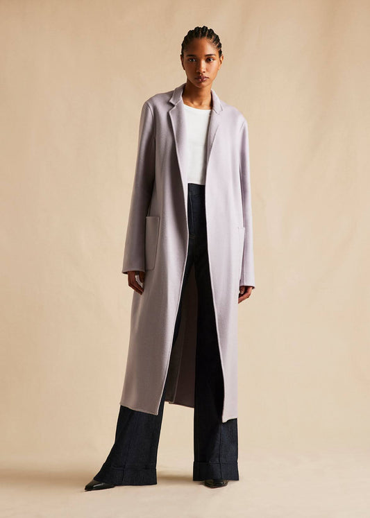 front facing full body image of model wearing the Vanessa coat in zibeline cashmere in lavender