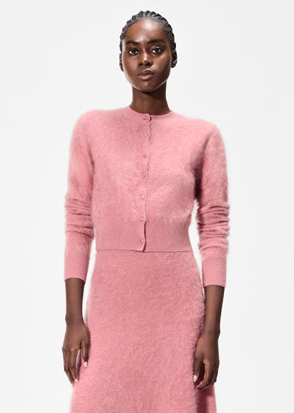 model wearing the cruz cardigan in brushed cashmere in rose by Adam Lippes