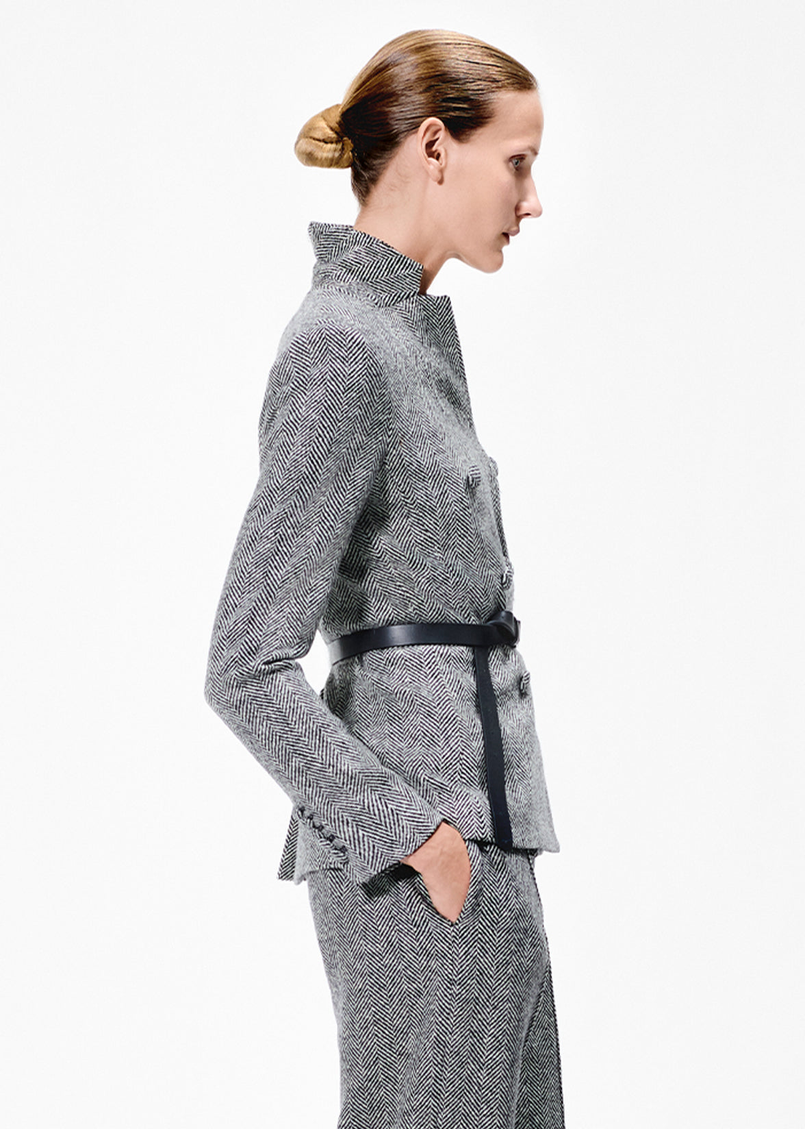 model wearing the spencer jacket in wool herringbone in black/ivory by Adam Lippes