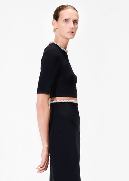 model wearing the jane top in wool crepe in black by Adam Lippes