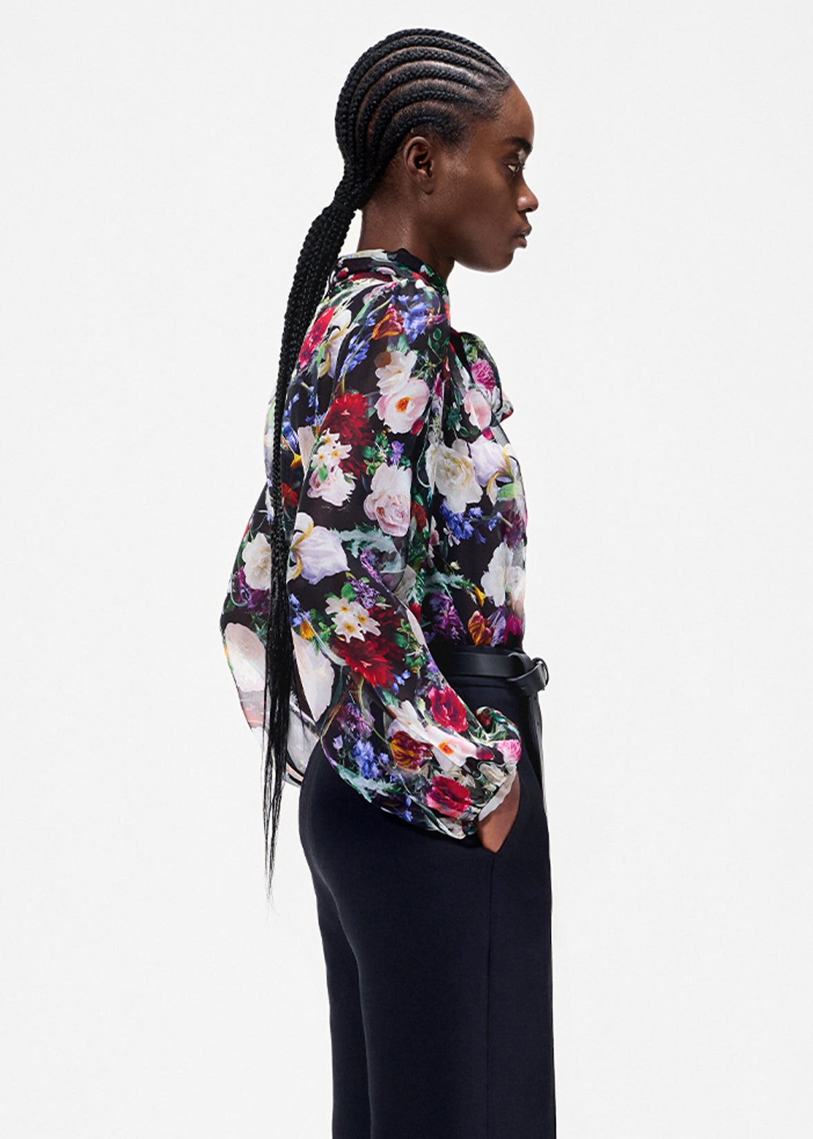 model wearing the joan blouse in printed chiffon in black floral 