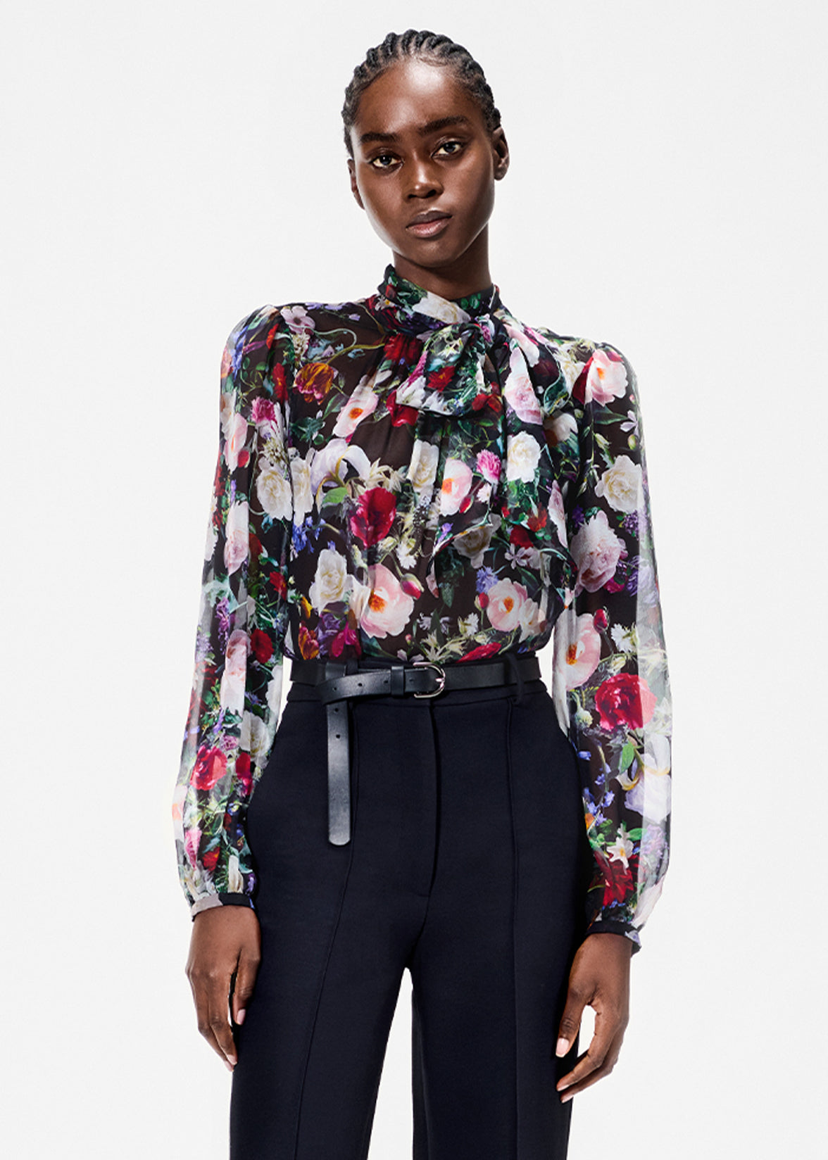 model wearing the joan blouse in printed chiffon in black floral 