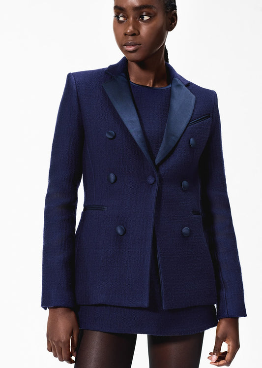 front facing model wearing the spencer jacket in toile de laine in navy