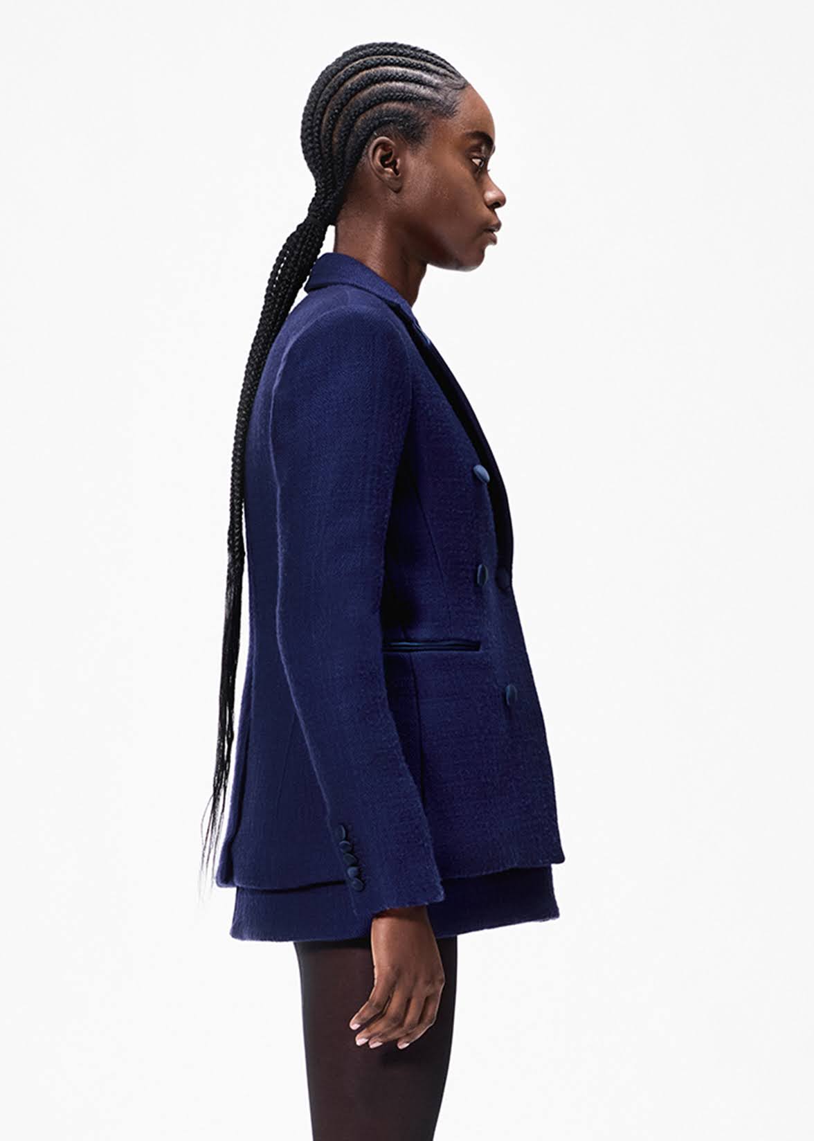 model wearing the spencer jacket in toile de laine in navy