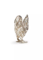 Photo of a sterling silver cockerel figure.