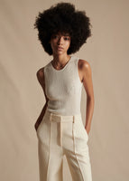 Model is wearing the ivory Shell in Silk Cashmere Ribbed Knit with the ivory Silk Wool Deeda Pant.