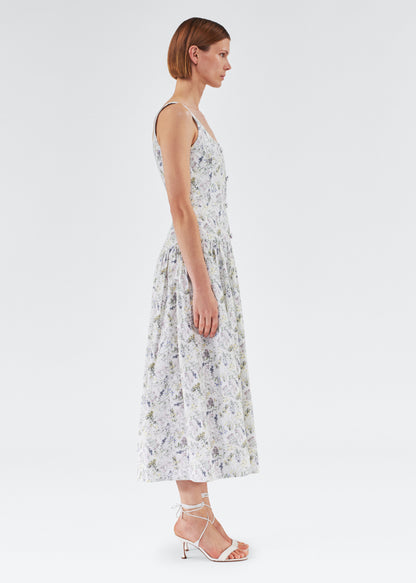 Side of model wearing the Cassie Dress in Printed Poplin in ivory floral