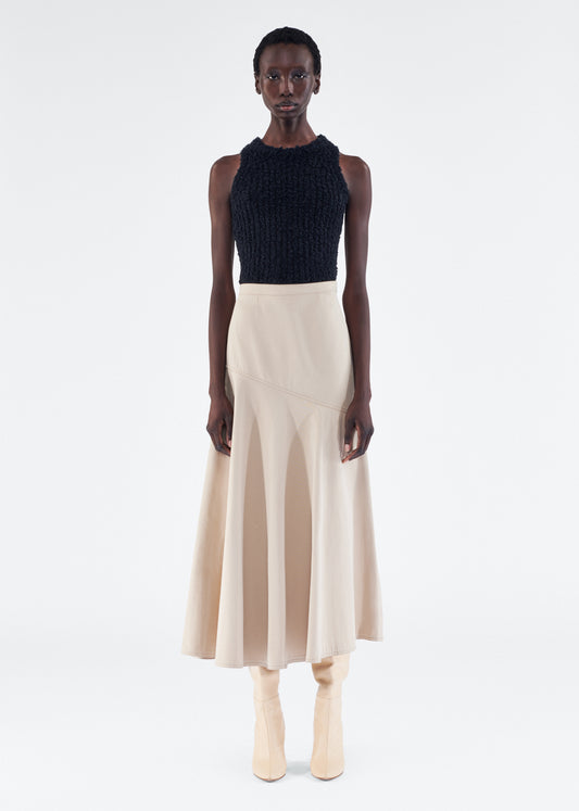 Model wearing the Tess Skirt in Cotton Twill, in Khaki 