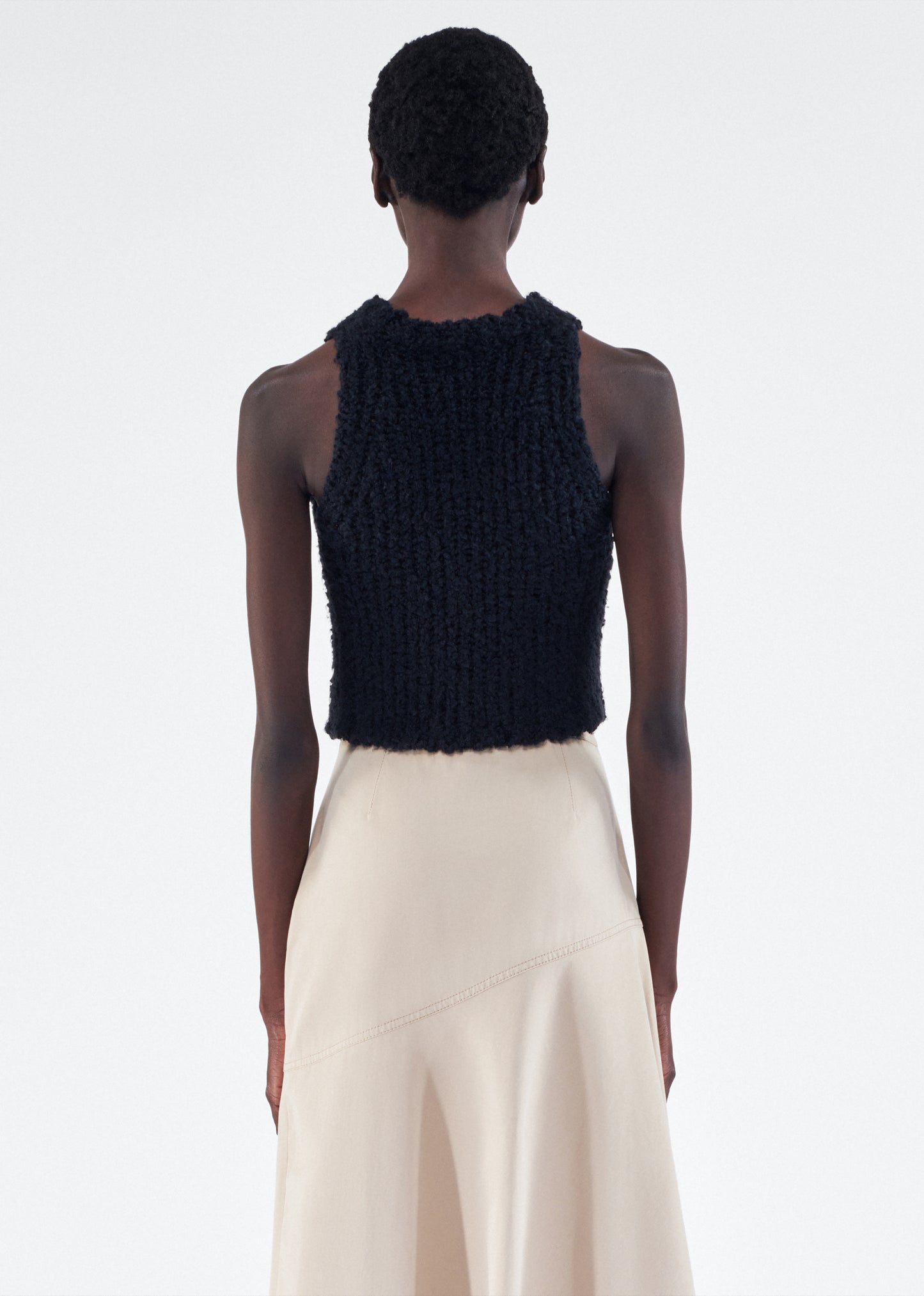 Back of model wearing the Liana Top in Mulberry Silk in Black