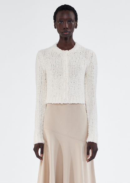 Front of model wearing the Alice Cardigan in Mulberry Silk in Ivory