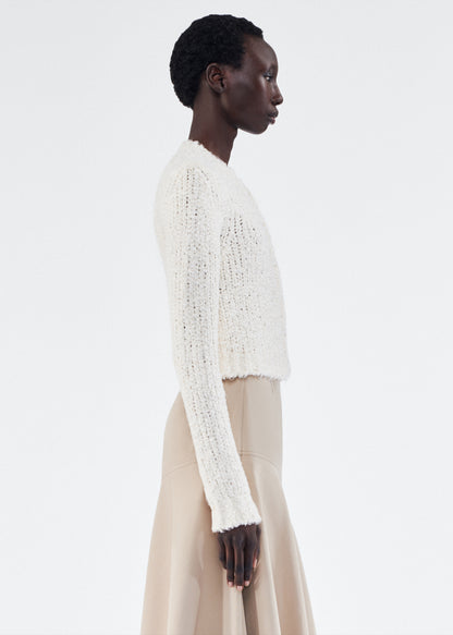 Back of model wearing the Alice Cardigan in Mulberry Silk in Ivory