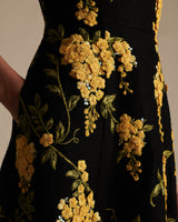 Close up of the yellow embroidered flowers on the Eloise Dress.