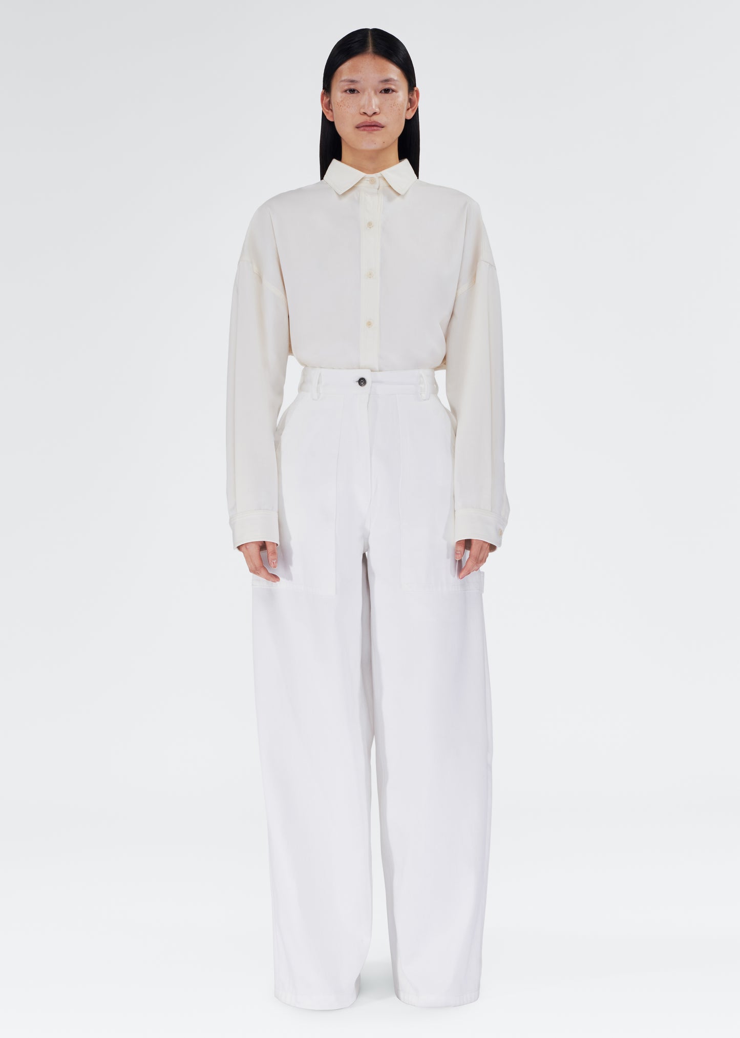 Front of model wearing the Jasper Pant in White Denim