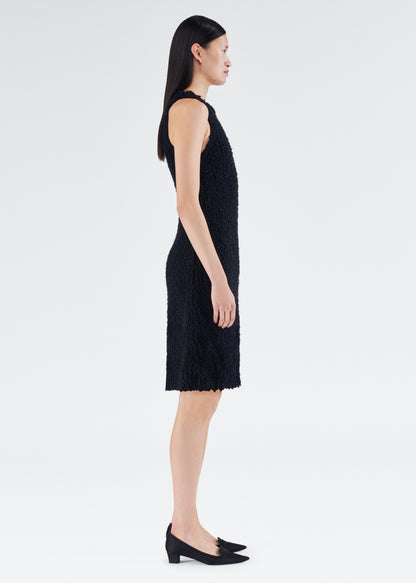 Side of model wearing the Renata Dress in Mulberry Silk in Black