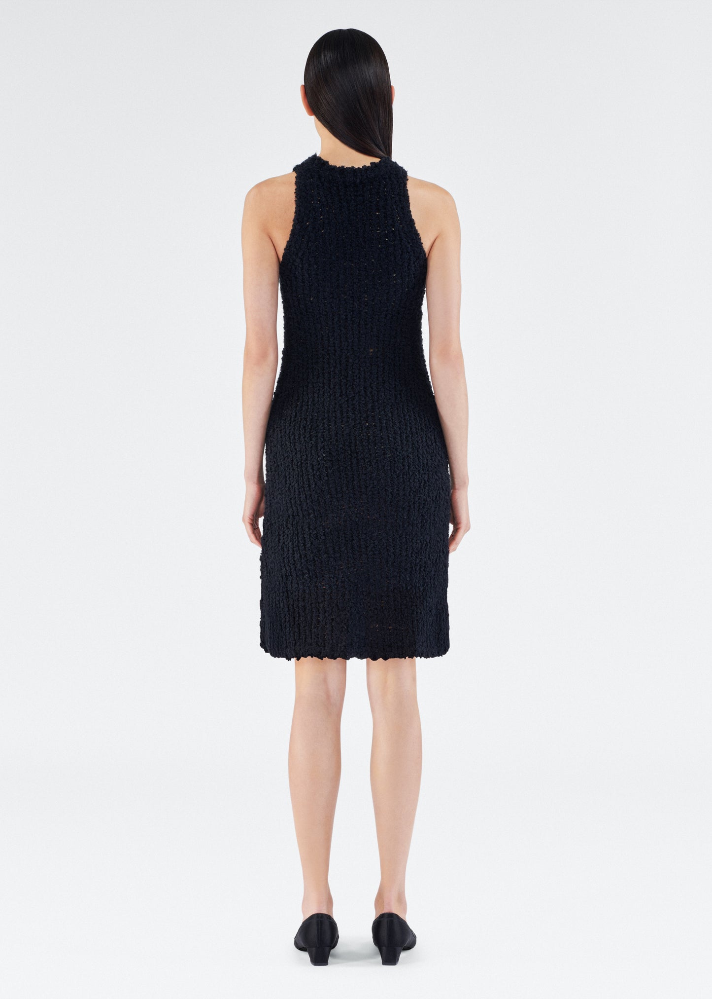 Back of model wearing the Renata Dress in Mulberry Silk in Black