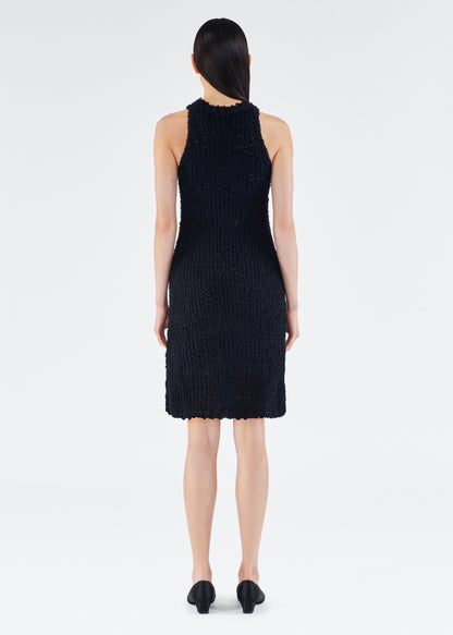 Back of model wearing the Renata Dress in Mulberry Silk in Black