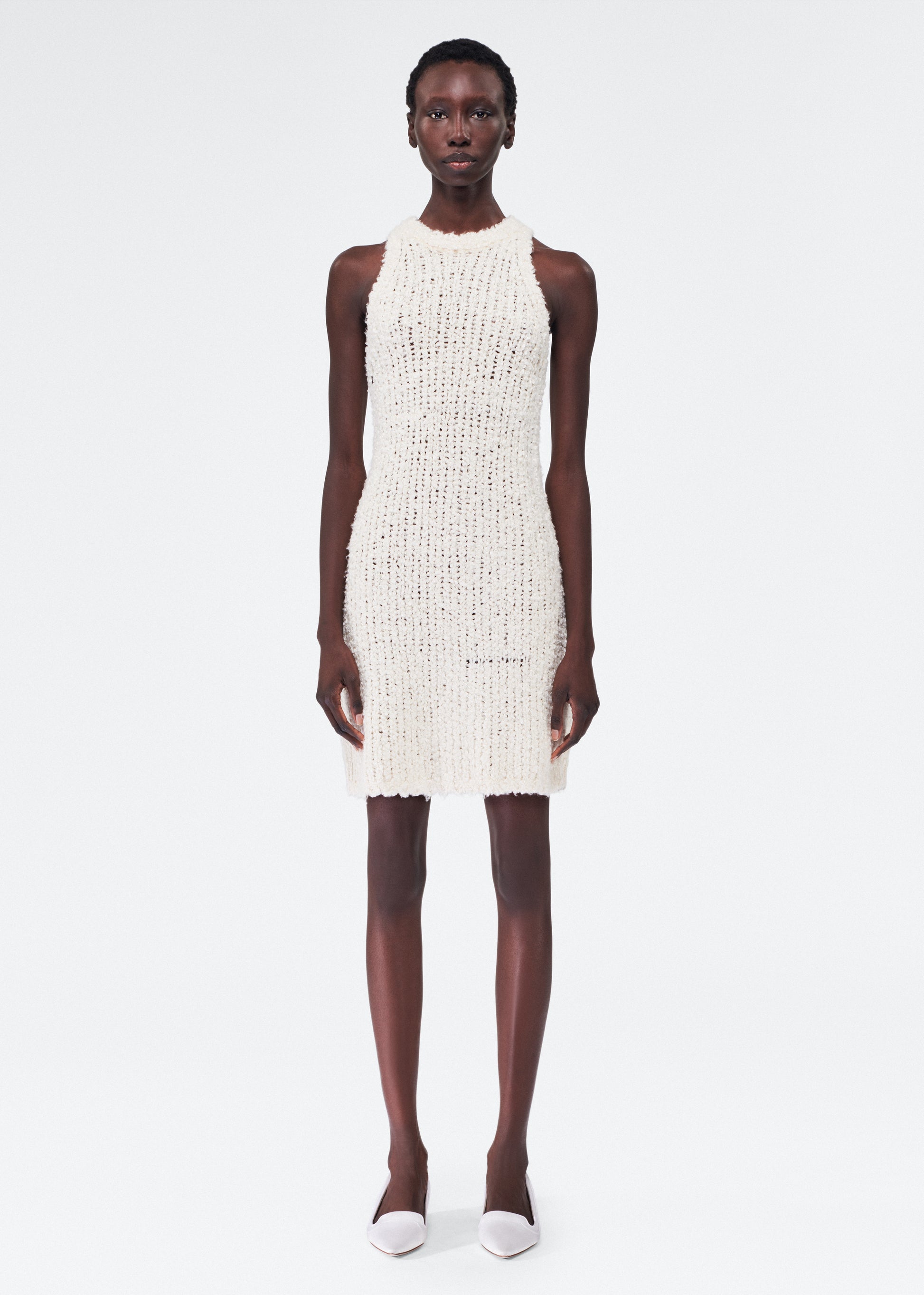 Front of model wearing the Renata Dress in Mulberry Silk in Ivory