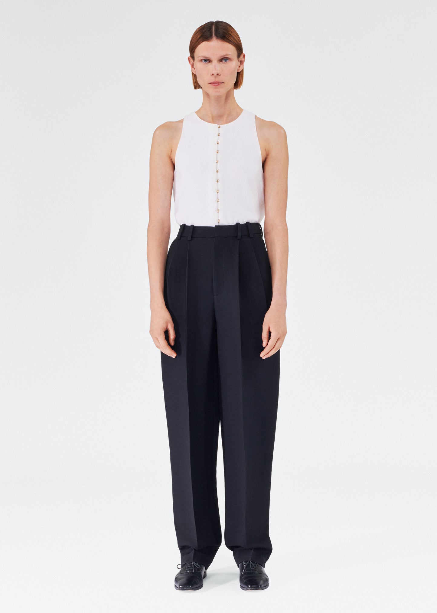 Front of model wearing the Nichols Pant in Silk Wool in Black